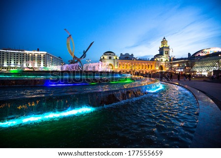 MOSCOW, RUSSIA - JUNE 14: View of Kievskiy railway station at night in June 14, 2012 in Moscow, Russia. Station was opened 1918 in the Byzantine Revival style pronounced in the 51 m high clocktower.