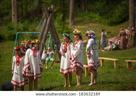 TERVENICHI, RUSSIA - JUL 7, 2013: Local people celebrated Ivan Kupala Day. The celebration relates to the summer solstice and includes a number of fascinating Pagan rituals.