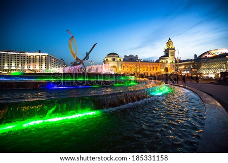 MOSCOW, RUSSIA - JUNE 14, 2012: View of Kievskiy railway station at night. Station was opened 1918 in the Byzantine Revival style pronounced in the 51 m high clocktower.