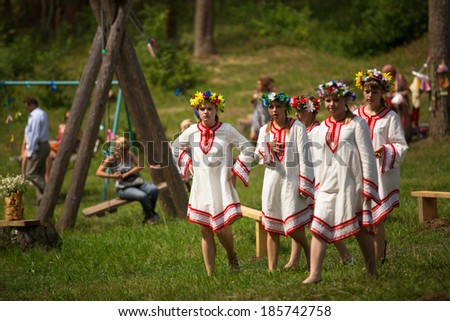 TERVENICHI, RUSSIA - JUL 7, 2013: Unidentified local children celebrated Ivan Kupala Day. The celebration relates to the summer solstice and includes a number of fascinating Pagan rituals.