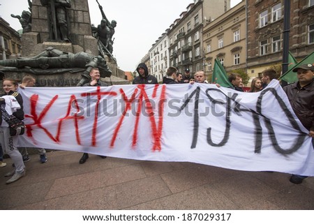 KRAKOW, POLAND - APR 13, 2014: Unidentified participants IV Procession Katyn in memory of all murdered in Apr 1940, more than 21,000 Polish prisoners from NKVD camps and prisons at behest of I.Stalin.