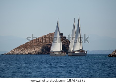 SARONIC GULF, GREECE - SEP 25, 2012: Unidentified sailors participate in sailing regatta \