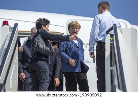 BERLIN, GERMANY - MAY 20, 2014: German Chancellor Angela Merkel (C) during open the International aviation and space exhibition ILA-2014.