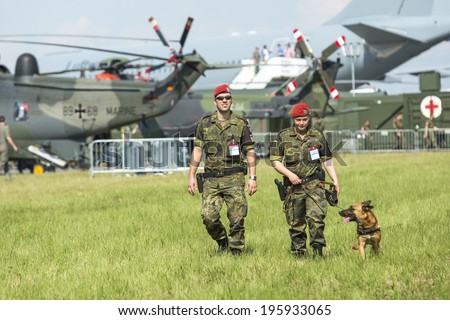BERLIN, GERMANY - MAY 20, 2014: Unidentified security staff during the International Aerospace Exhibition ILA Berlin Air Show-2014.