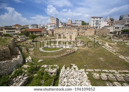 ATHENS, GREECE - MAY 10, 2014: Ruins in Athens in center of city. Tourism is a decisive sector of hope for Greek economy - In the year Greece receives about 18 million tourists.