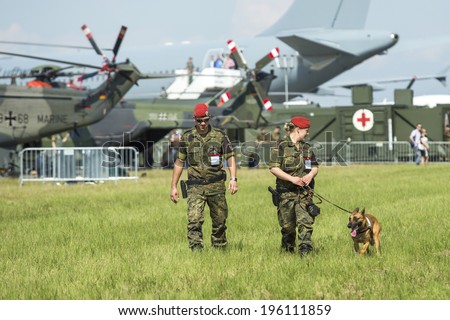 BERLIN, GERMANY - MAY 20, 2014: Unidentified security staff during the International Aerospace Exhibition ILA Berlin Air Show-2014.