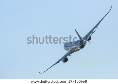 BERLIN, GERMANY - MAY 20, 2014: The aircraft Airbus A350 XWB, demonstration during the International Aerospace Exhibition ILA Berlin Air Show-2014.