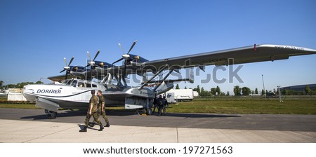 BERLIN, GERMANY - MAY 20, 2014: The Dornier Do 24 is a 1930s German three-engine flying boat for maritime patrol and rescue, demonstration during the Exhibition ILA Berlin Air Show.