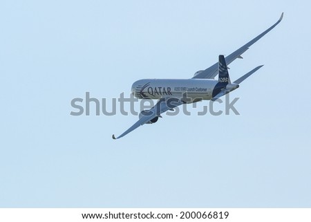 BERLIN, GERMANY - MAY 20, 2014: The aircraft Airbus A350 XWB, demonstration during the International Aerospace Exhibition ILA Berlin Air Show-2014.