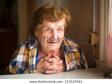 Portrait of a smiling elderly woman.