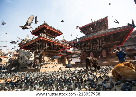 KATHMANDU, NEPAL - NOV 28, 2013: Old Durbar Square with pagodas. Largest city of Nepal, its cultural center, a population of over 1 mill people, density of 19867 people/Km.