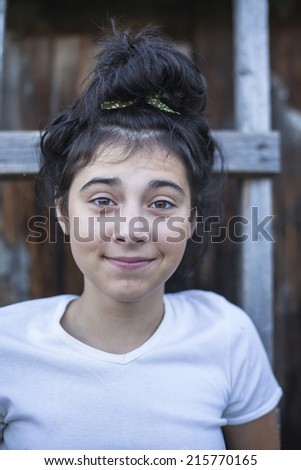 Teenager girl on a street in the countryside.