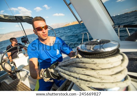 GALAXIDI, GREECE - SEP 29, 2014: Unidentified sailors participate in sailing regatta \