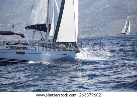 HYDRA, GREECE - CIRCA OCT, 2014: Sailors participate in sailing regatta 12th Ellada Autumn 2014 among Greek island group in the Aegean Sea, in Cyclades and Argo-Saronic Gulf.