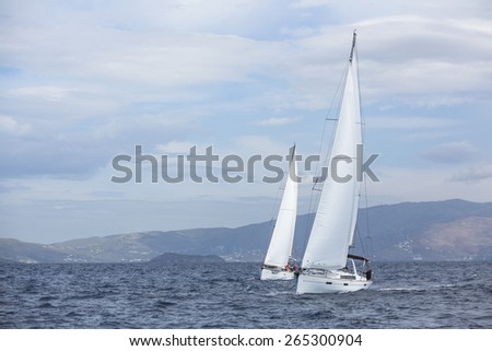 ANDROS, GREECE - CIRCA OCT, 2014: Sailboat participate in sailing regatta 12th Ellada Autumn 2014 among Greek island group in the Aegean Sea, in Cyclades and Argo-Saronic Gulf.