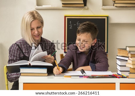 School tutor with young student.