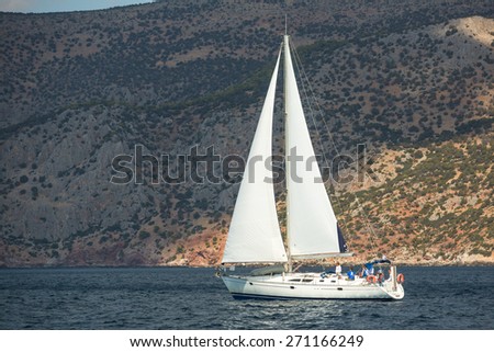 HYDRA, GREECE - CIRCA OCT, 2014: Sailboat participate in sailing regatta 12th Ellada Autumn 2014 among Greek island group in the Aegean Sea, in Cyclades and Argo-Saronic Gulf.