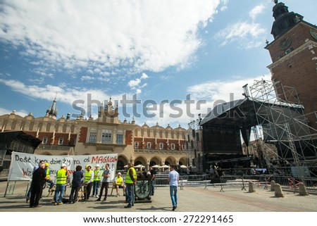 KRAKOW, POLAND - APR 24, 2015: Builders protest against of embezzlement during the construction of the new district (Inscription on the banner: Stop stealing on the construction of the \