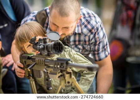 KRAKOW, POLAND - MAY 3, 2015: Unidentified people during demonstration of the military and rescue equipment during annual Polish national and public holiday the Constitution Day May 3rd.