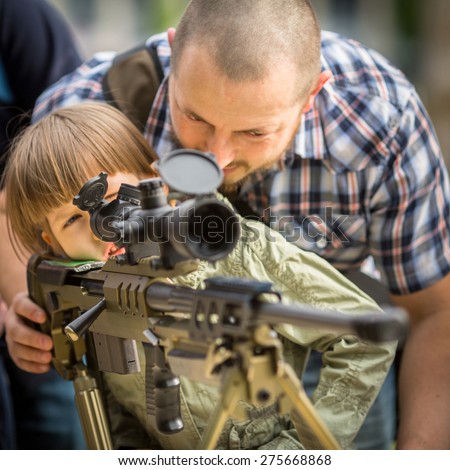KRAKOW, POLAND - MAY 3, 2015: Unidentified people during demonstration of the military and rescue equipment during annual Polish national and public holiday the Constitution Day May 3rd.