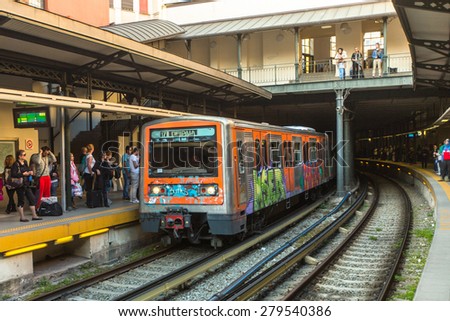 ATHENS, GREECE - APR 13, 2015: Urban metro station with subway train. The Athens Metro is a rapid-transit system opened as a conventional steam railway in 1869, and which was electrified in 1904.