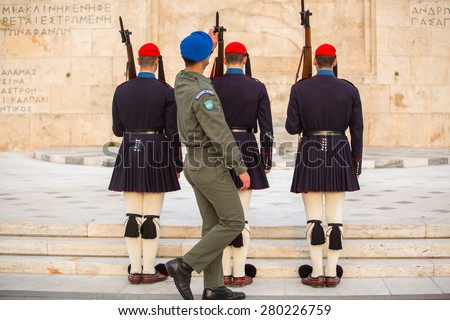 ATHENS, GREECE - APR 14, 2015: Greek soldiers Evzones (or Evzoni) dressed in service uniform, refers to the members of the Presidential Guard, an elite ceremonial unit, active from 1833 - present.