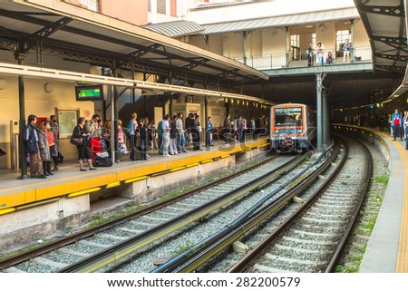 ATHENS, GREECE - APR 13, 2015: Urban metro station with subway train. The Athens Metro is a rapid-transit system opened as a conventional steam railway in 1869, and which was electrified in 1904.