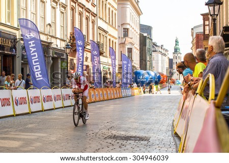 KRAKOW, POLAND - AUG 8, 2015: Unidentified participants of 72th Tour de Pologne cycling 7th stage race. Tour de Pologne is the biggest cycling event in Eastern Europe.
