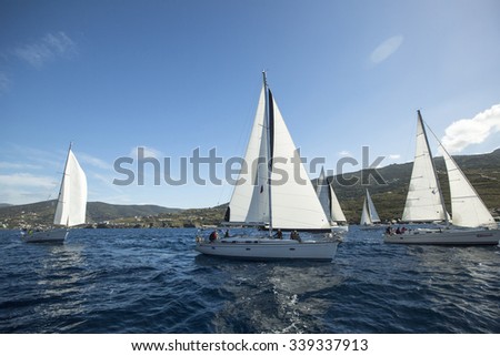 HYDRA, GREECE - CIRCA OCT, 2014: Sailboats participate in sailing regatta Ellada Autumn 2014 among Greek island group in the Aegean Sea, in Cyclades and Argo-Saronic Gulf.