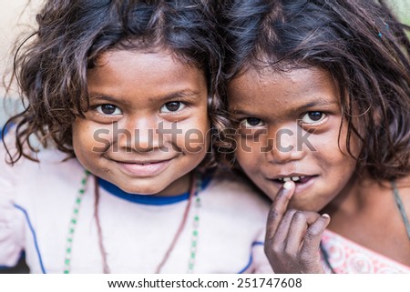 GAYA, INDIA - JANUARY 25: Unidentified Indian girls smile and poses for photo shooting on Jan 25, 2015 in Gaya, India.