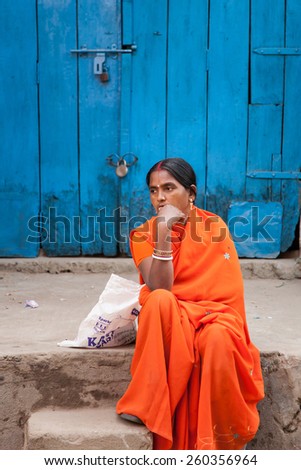 Gaya, India, 25 November,  Unidentified woman sitting outside her home on November 25, 2012 in Gaya, India.