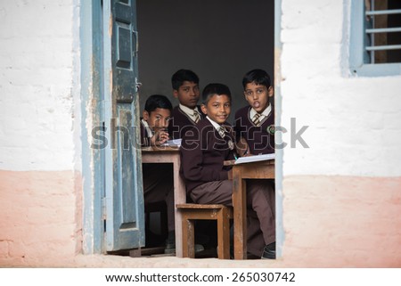 SARANATH,INDIA-DECEMBER 03, 2012.:The unidentified Indian students at the class room in Thai Saranath school on December 03,2012 in Pelling,India.