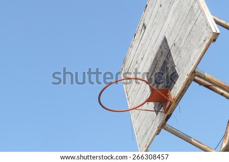 old wooden basketball hoop in the park