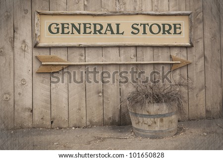 A vintage sign pointing to a General Store. Wild West theme .