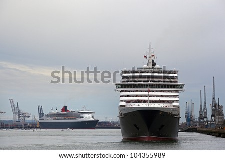 SOUTHAMPTON, UK - 5 JUNE:Three Queens - Cunard ships Queen Mary 2 & Queen Victoria meet in the port of Southampton to join the Queen Elizabeth to celebrate the Diamond Jubilee. 5 JUNE 2012
