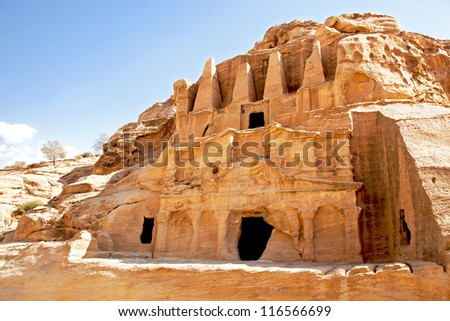 Cave dwellings in the lost city of Petra, Jordan. Petra is one of the new Seven Wonders of the World and is also referred to as the Rose-Red city due to the colour of the rocks.