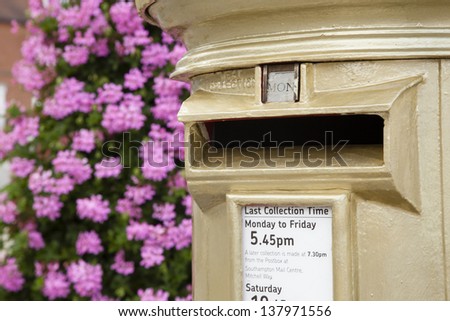 HAMBLE, NR SOUTHAMPTON, UK - AUG 8 : UK Royal Mail honours Olympic Gold Medal winners, by transforming a post box from red to gold in the home town of each gold medalist. 8 Aug 2012