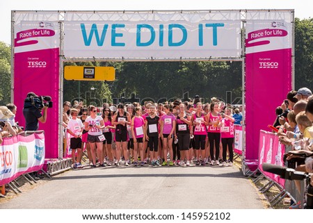 SOUTHAMPTON, UK - JULY 14 : Thousands of women gather for the annual Race for Life to raise money for Cancer Research. 14 July 2013 in Southampton, UK.