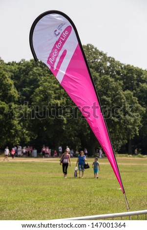 SOUTHAMPTON, UK - JULY 14: Banner for the annual Race for Life to raise money for Cancer Research on July 14, 2013 in Southhampton, UK.
