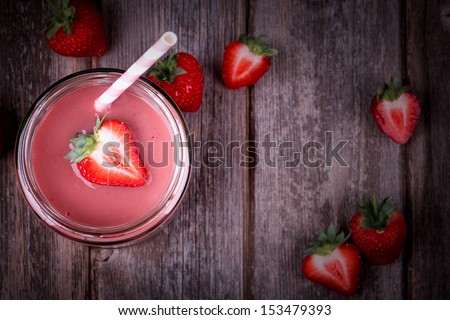 Strawberry Smoothie In Glass Jar, Over Old Wood Table. Vintage Effect With Intentional Vignette