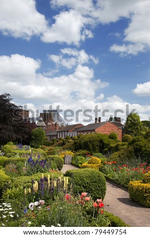 The garden of Nash\'s house, Stratford-upon-Avon. This house was bought by William Shakespeare for his granddaughter. The Royal Shakespeare Theatre can be seen in the background.