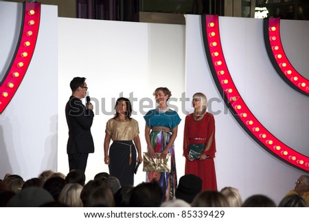 SOUTHAMPTON, UK - SEPT 22: Gok Wan introduces three local nurses who have been the subject of his makeover. West Quay shopping centre during filming of Gok\'s Clothes Roadshow. 22 September 2011, Southampton