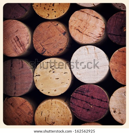 Retro style pink wine cork background. Cross processed to look like an aged instant photo.
