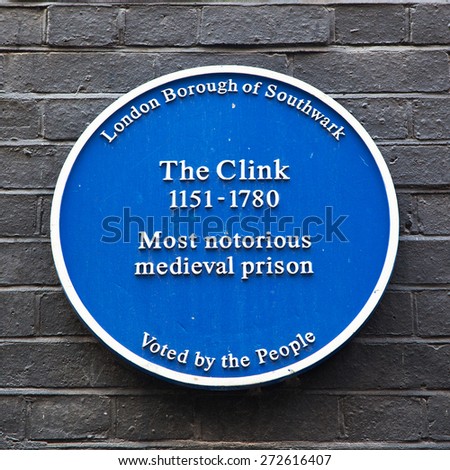 LONDON, UK - AUGUST 11: Blue Plaque commemorating the site of the notorious medieval prison The Clink, which functioned between the 12th and 18th centuries.  On Bankside, London, August 11 2012