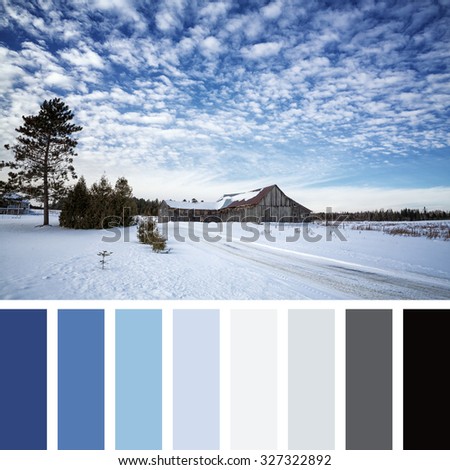 Old barn in the snow, Beauce, Quebec Province, Canada.  In a color palette with complimentary color swatches.