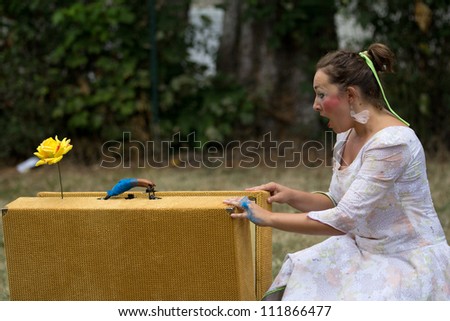 Theaters  on Aurillac  France   August 23   Actress Near An Old Suitcase As Part Of