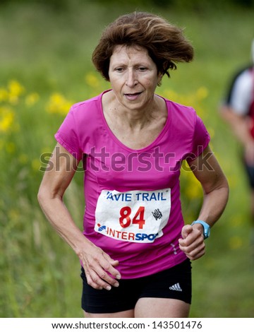 PAVIE, FRANCE - JUNE 23:Portrait of an elderly runner at the Trail of Pavie, on June 23, 2013, in Pavie, France.