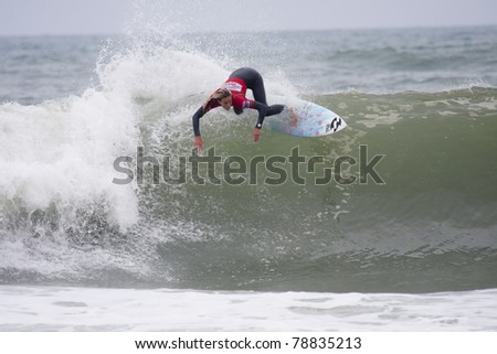 SEIGNOSSE, FRANCE - JUNE 3: American surfer Courtney Conlogue at the Swatch Pro France on June 3, 2011 in Seignosse, France.