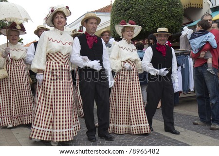 SOULAC SUR MER, FRANCE - JUNE 5: Group of elderly people  at the Soulac 1900 festival on june 5, 2011 in Soulac sur mer, France. Every year all the resort relives his Belle Epoque 1900 .
