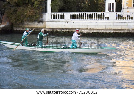 VENICE, ITALY - NOVEMBER 25:  An unidentified team of rowers trains for the Regata Storica, the main event in the annual rowing calendar, on November 25, 2011, in Venice, Italy.